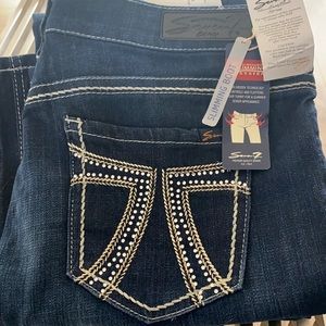 Ladies size 14 Seven Dark blue “slimming boot cut” jeans, new with tags